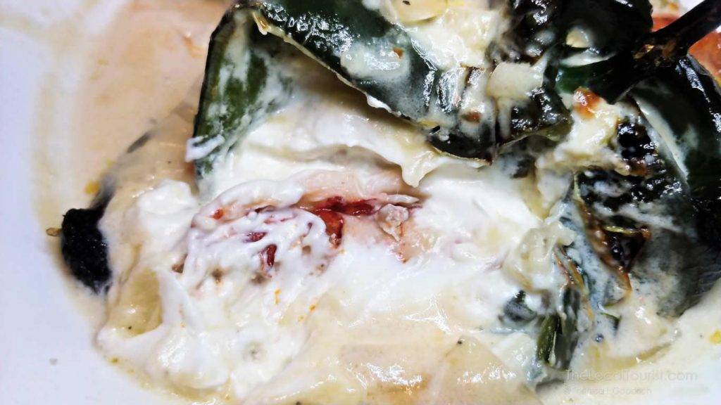 Poblano pepper stuffed with lobster and goat cheese
