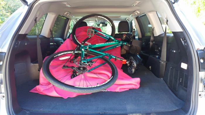 Interior of the 2017 Toyota Highlander with my pretty Schwinn hybrid